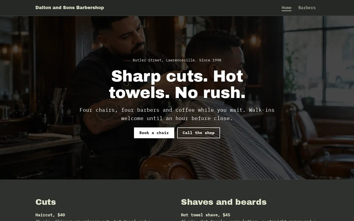 The barber website template on a desktop screen